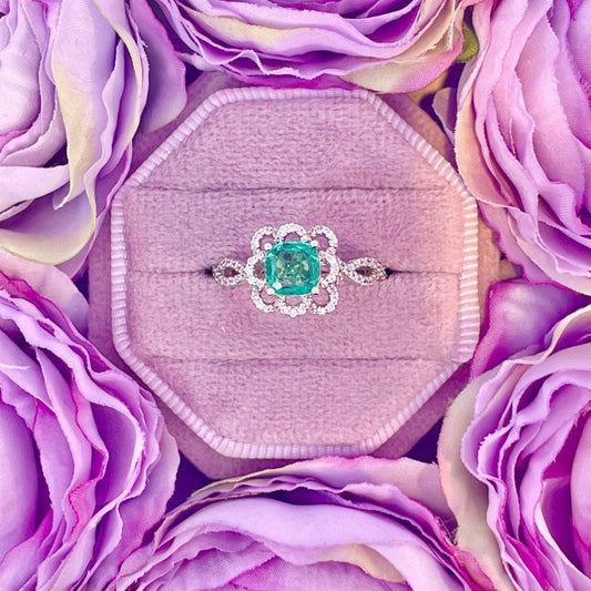 Floral emerald and diamond ring in 14k white gold