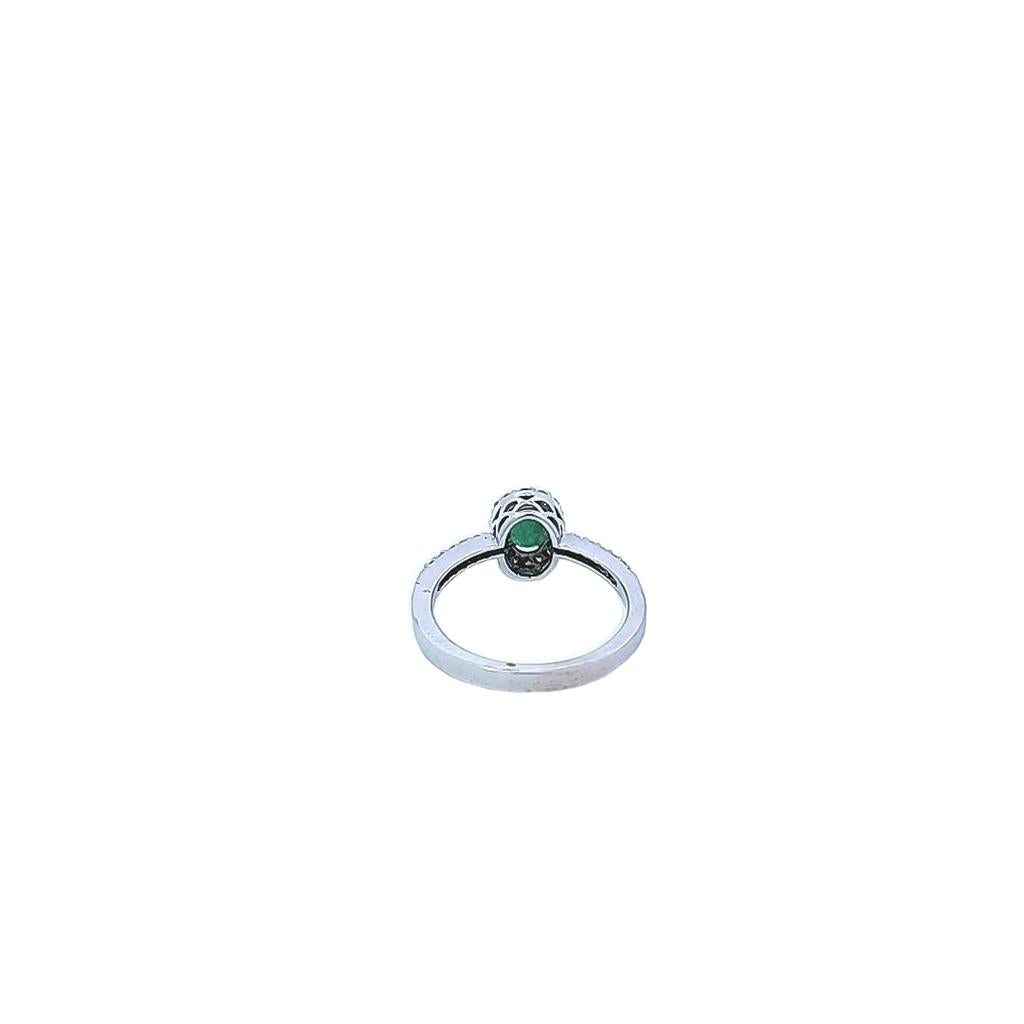 White Gold Emerald and Diamond Halo Ring